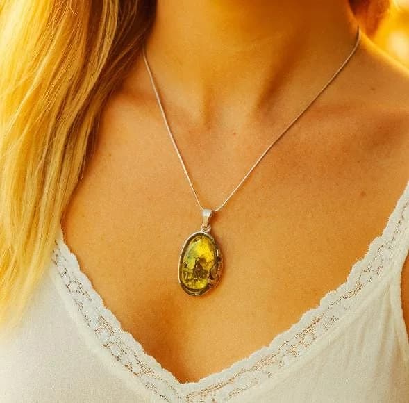 The Baltic Amber Leaf Pendant in 925 sterling silver, view 1